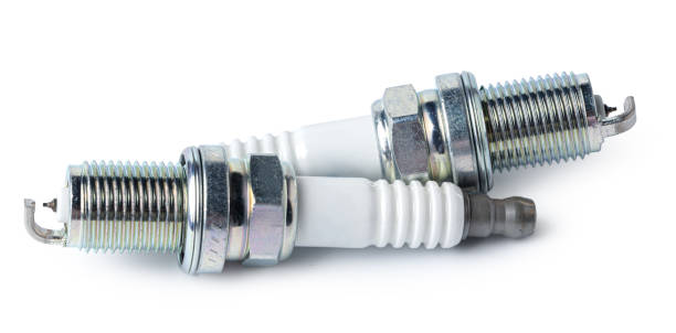 istock Car part. Spark plugs isolated on white. 1414238982