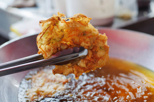 Cucur udang is the Malaysian version of prawn fritters, popular street food.