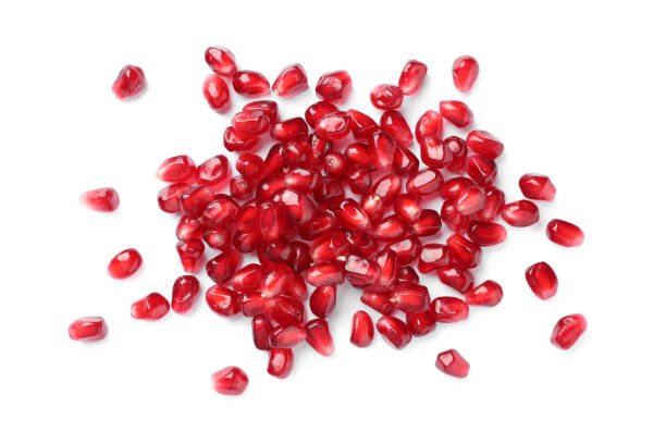istock Tasty pomegranate seeds on white background, top view 1414243427