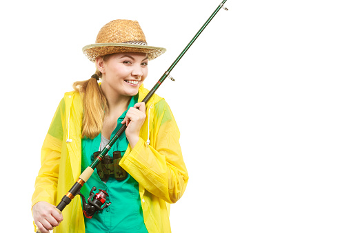 Fishery, spinning equipment, angling sport and activity concept. Woman with fishing rod.