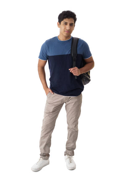 Full shot of university student , holding backpack and looking at camera over white background.