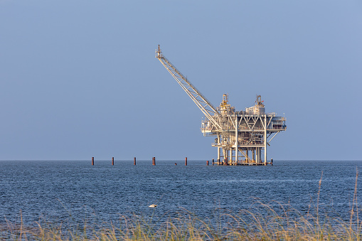 Offshore drilling platform just off shore in the Gulf of Mexico used for domestic energy production.