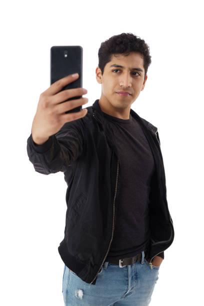 istock Young man talking selfie and smiling 1414250770
