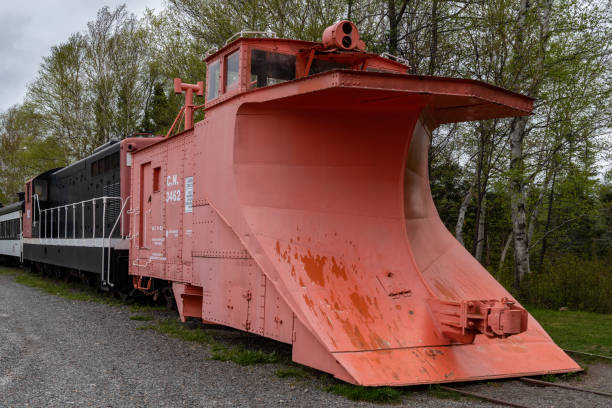 Wedge snow plow used to push snow off train tracks, Newfoundland, Canada.