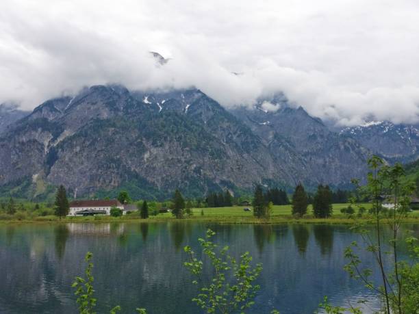 istock Spring mountains and lake in Austria. Green and blue colors. 1414256371