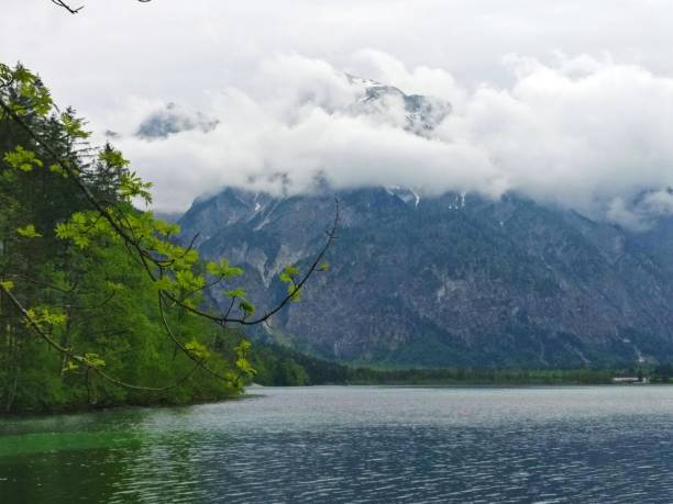 istock Spring mountains and lake in Austria. Green and blue colors. 1414256481