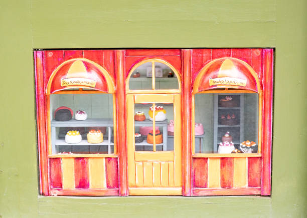 Miniature Bakery in Rethymnon Old Town on Crete, Greece, part of a bookshop and located on the exterior wall on the street.