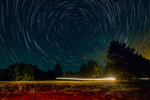 Long exposure shot of a star trails with North Star in the middle