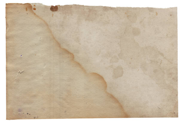 Old vintage rough paper with scratches and stains texture isolated stock photo