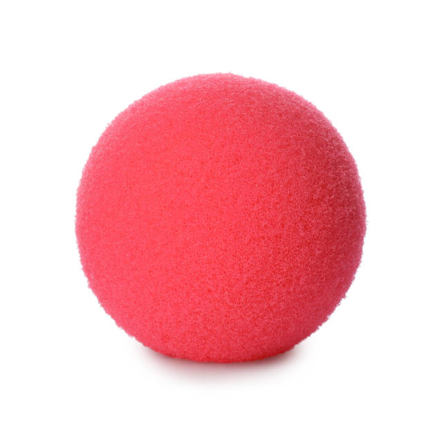 istock Red foam clown nose isolated on white. Party item 1414263825