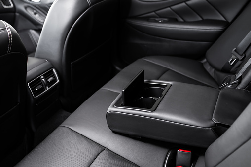 details of the car interior, black leather interior
