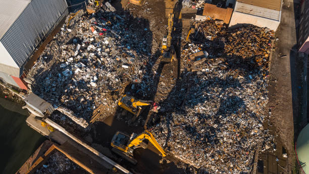 istock In a scrap yard, scrap handlers load scrap metal. 1414266556