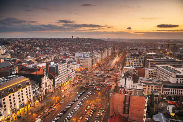 Brussels, Belgium cityscape over Boulevard de Waterloo at dusk.