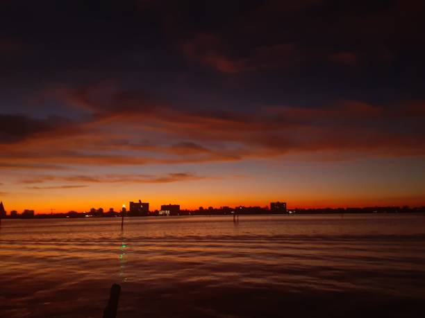 istock Sunset Over the Water 1414267858