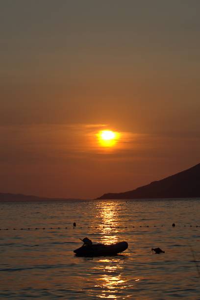 istock sunset over the sea 1414272778