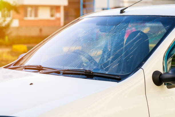 istock broken windshield of a car on a city street 1414273775