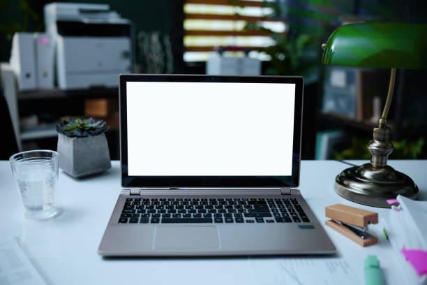 istock desk with laptop in morning in modern office 1414274649