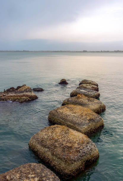 Step Stones In Blue rippling Water - Zen, life challenges, moving on, relax concept