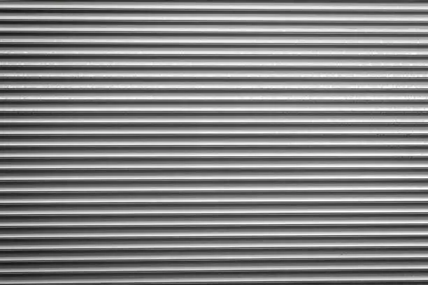 Photo of Metal gray garage door for background