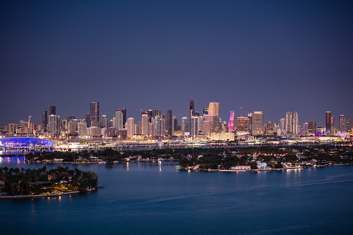 View of  the skyline of Downtown Miami, looking across the Venetian Islands, Palm and Hibiscus Islands ant the Port of Miami-Dade in Biscayne Bay from Miami Beach.  This image is part of a series of views taken at different times of day from the same location; a time lapse is also available.
