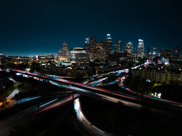 istock 10/110 Interchange and DTLA Skyline at Night - Aerial 1414276295