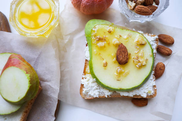 istock sandwich with cottage cheese, pear, honey and nuts 1414280385