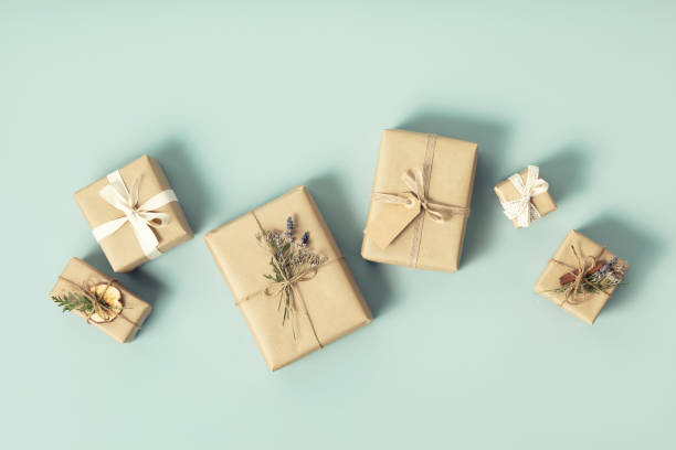 Christmas gift boxes on blue background flat lay