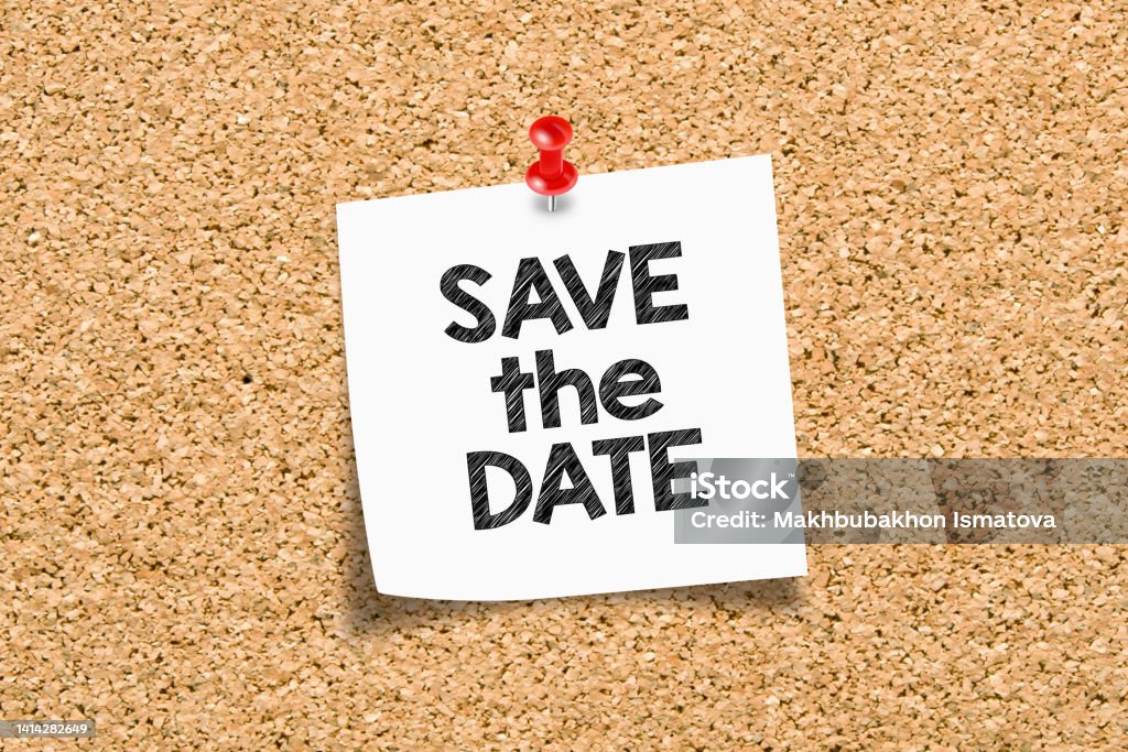 Save the date concept Save the date. Save the date written on sticky note pinned on cork notice board. Save The Date - Short Phrase Stock Photo