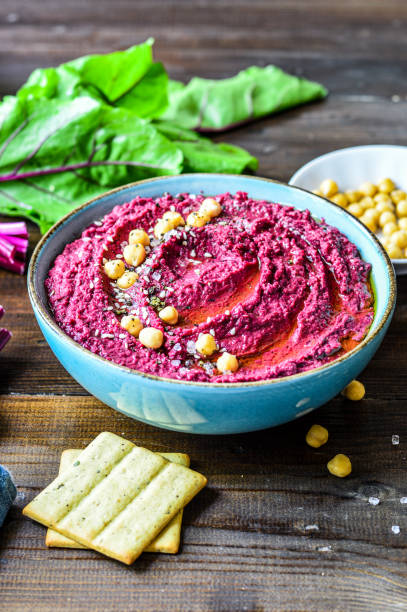 istock Red Beetroot Hummus with fresh vegetables and Olive oil 1414287091