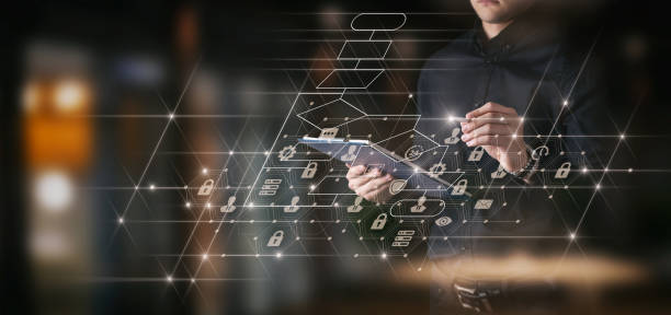 istock Businessman works on a tablet on a blurred evening city. 1414287130