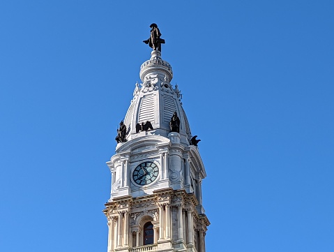 The statue of William Penn adorns the top of City Hall marking the center of the city of Philadelphia. One of the greatest municipal buildings in the world and a definite marvel from the perspective of Love park across the street.