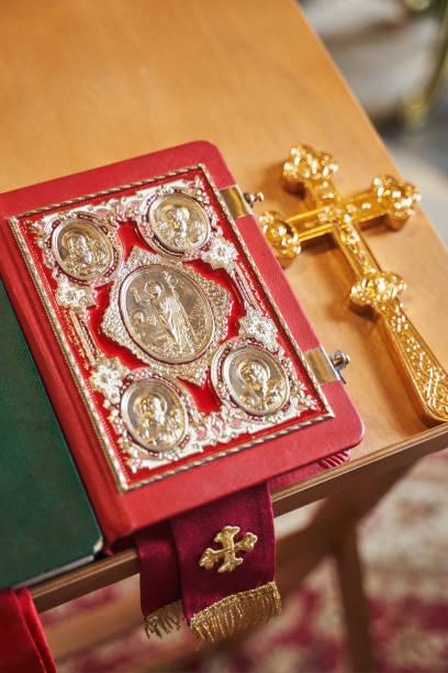 istock orthodox bible and cross on a stand for a priest 1414289767