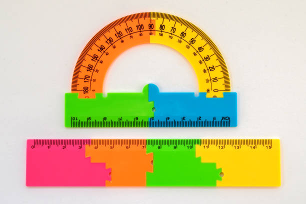 multicolored ruler and protractor school and stationery for drawing and geometry on a white background