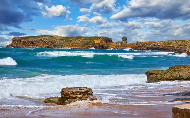 Photo of Portugal. Atlantic coast surf of Ocean with rocks