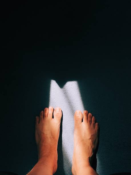human shadow photo on the wall