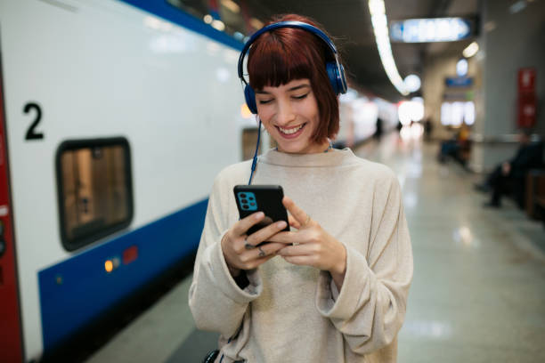 istock Young woman walking through the subway 1414300619