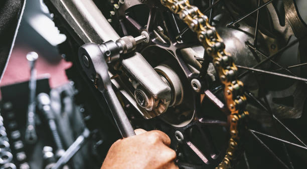 istock Mechanic working in garage. Repair service. 1414303902