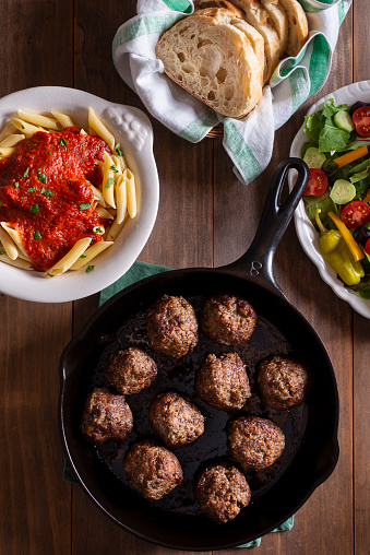 Homemade Meatballs with Pasta, Salad and Italian Bread.