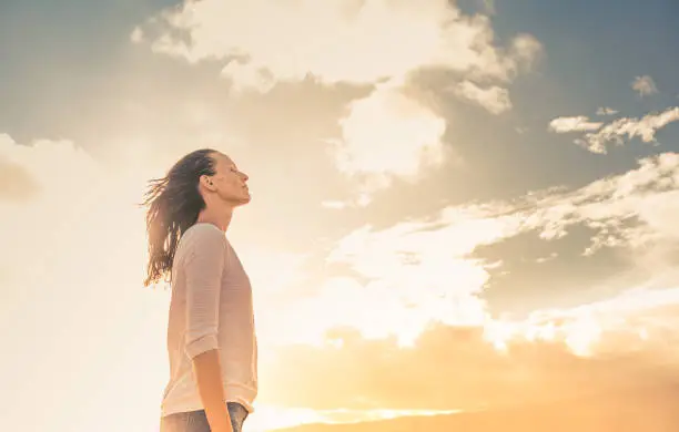 Photo of Young woman feeling free.