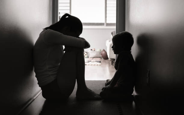 istock Sad mother and child. Family domestic issues and problems. 1414308160