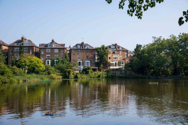 istock Hampstead No 1 Pond with Houses in background 1414309054