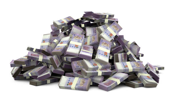 istock Big pile of Malaysian ringgit notes a lot of money over white background. 3d rendering of bundles of cash 1414311706
