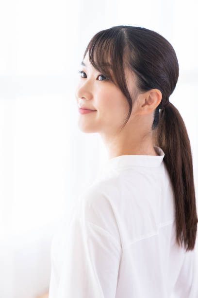 istock attractive asian woman relaxing 1414316447
