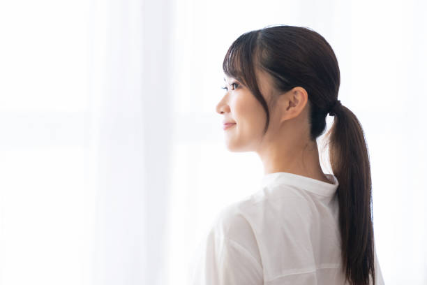 istock attractive asian woman relaxing 1414316486