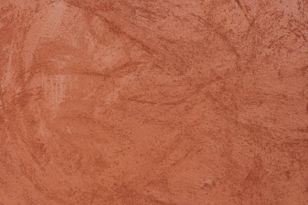 orange-brown cement wall texture background, wallpaper abstract grunge pattern surface retro backdrop. - toprak askerler stok fotoğraflar ve resimler
