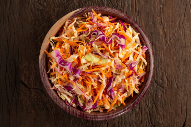 istock Coleslaw salad with white cabbage, red cabbage and sliced carrots. 1414321306