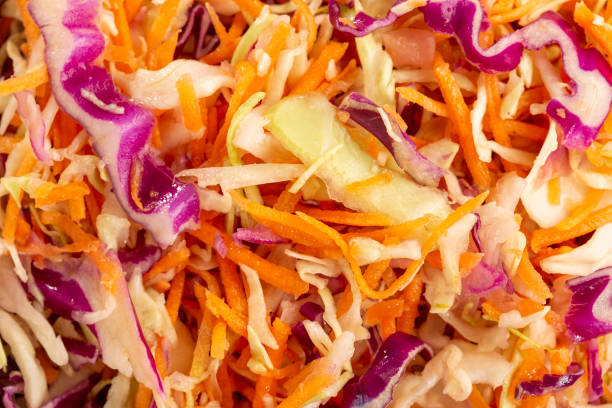 istock Coleslaw salad with white cabbage, red cabbage and sliced carrots. 1414321324
