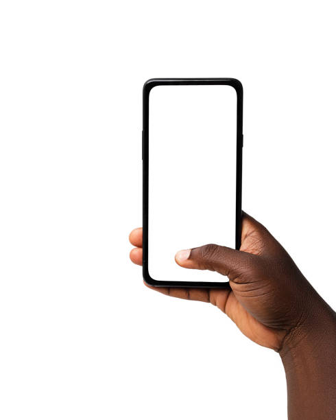 istock Black hand holding and pressing phone screen facing camera isolated on white background. blank screen, phone screen mockup, front view, clipping path, clipping mask 1414324013