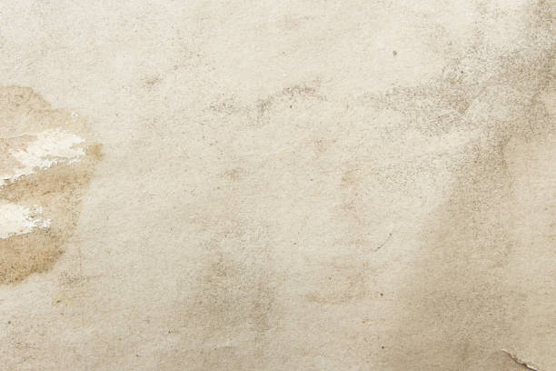 istock White beige paper background texture light rough textured spotted blank copy space background 1414325391