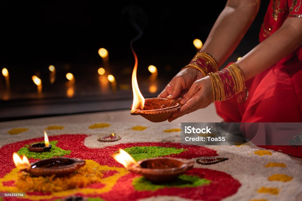 Traditional diya lamps lit during diwali celebration Diwali Stock Photo